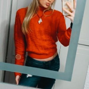 red turtleneck sweater